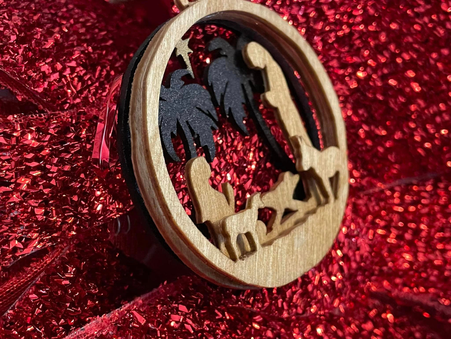 Three-layer nativity ornament.